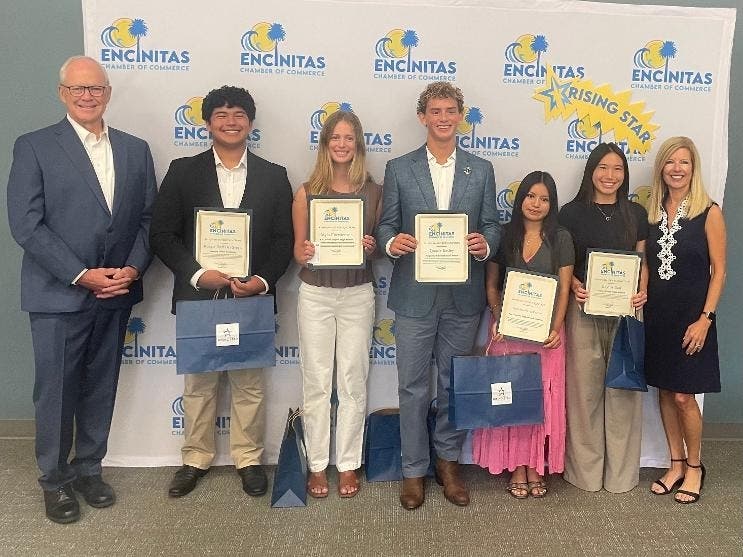 L-R: Encinitas Mayor Bruce Ehlers, Reego-Darian Rivera, Myla Christenson,  Quade Kelley, Francisca Perez Carillo, Baylin Tsai, and Encinitas Chamber of Commerce CEO Carol Knight.