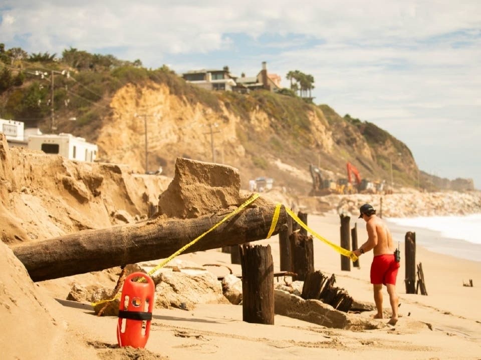 Malibu officials warned the public of hazardous conditions on the beach due to severe erosion.