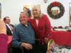 Rep. Denise Garlick shares a laugh with Paul Hinkley and expresses her gratitude for his service to the Tilden Village community.