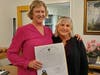 Eileen DeSorgher with State Rep. Denise Garlick after accepting the House of Representatives Resolution. (Garlick officially represents Medfield precincts 1 and 2, but likes to say she "unofficially represents all of Medfield.")