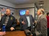 Sen. Paul Feeney (center) catches up with Medfield DTC members Paul Hinkley and Michael Filosa.