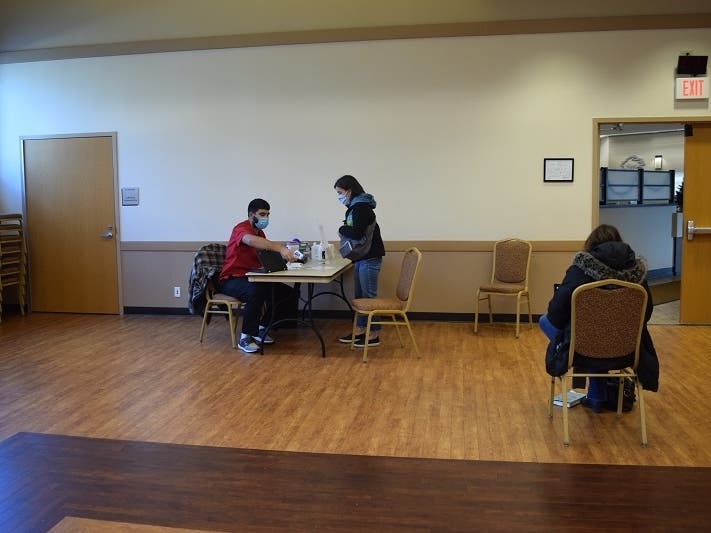 Participants check in at Alfred Rubin Riverwalk Community Center, 12-5-20