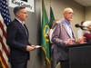 King County Executive Dow Constantine, left, and Dr. Jeff Duchin speak at a news conference Saturday after a King County man died from the new coronavirus, the first reported death in the United States.