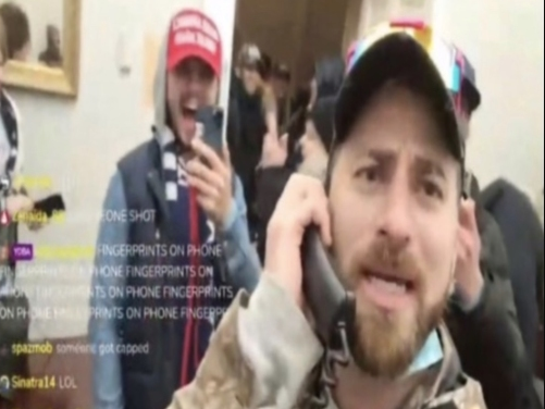 Anton Lunyk, back, is shown during a livestream on Jan. 6, 2021, as thousands of Trump supporters stormed the U.S. Capitol, according to officials.