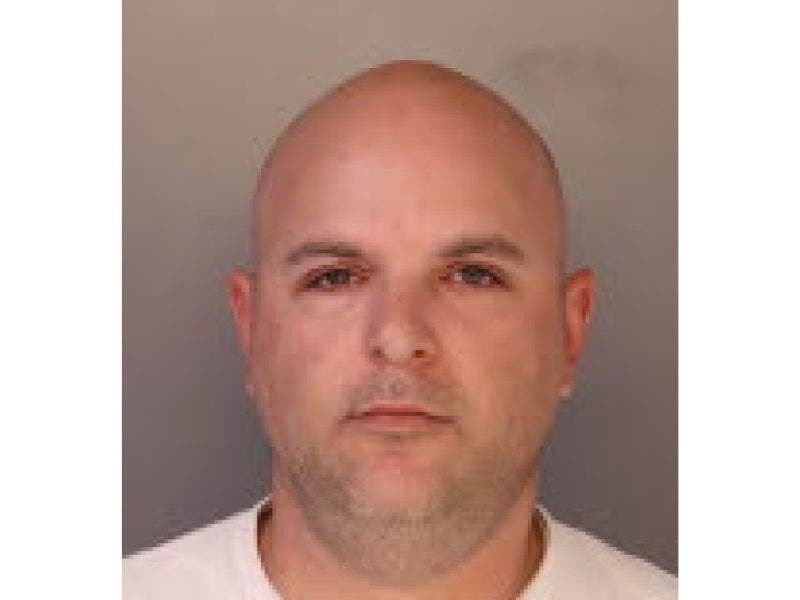 Ronald Davis, of Williamstown, was charged with strangulation, unlawful restraint, assault and false imprisonment following the off-duty incident where authorities said he strangled his ex-girlfriend and committed her against her will.