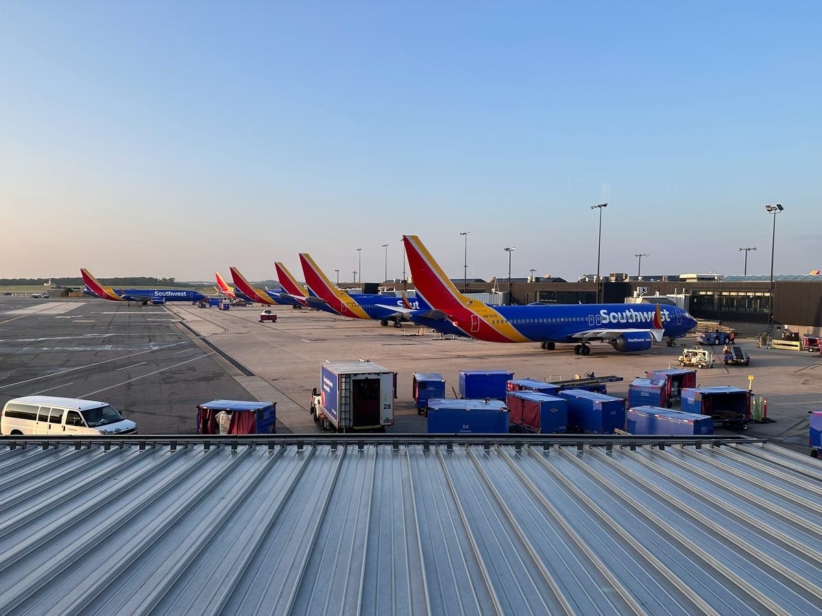 The person who told Baltimore/Washington International Airport​ authorities they had a bomb in their vehicle was taken into custody and admitted to the hospital for mental health treatment, police said.