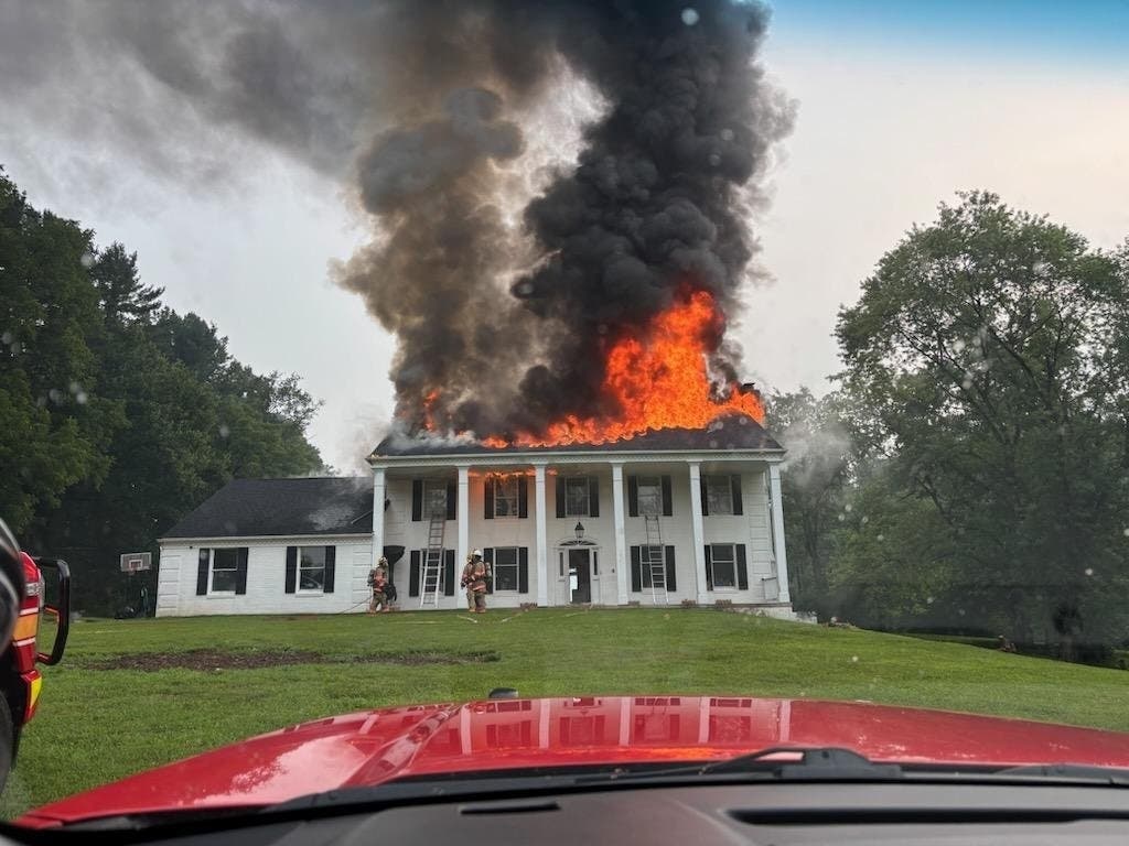 Five people were displaced and one firefighter was injured after a house fire early Saturday, according to officials.