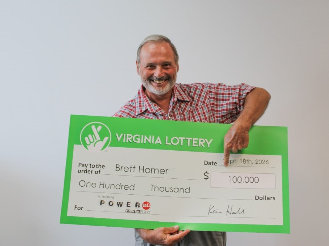 Brett Horner matched five Powerball numbers, and a $1 add-on doubled his winnings from $50,000 to $100,000.