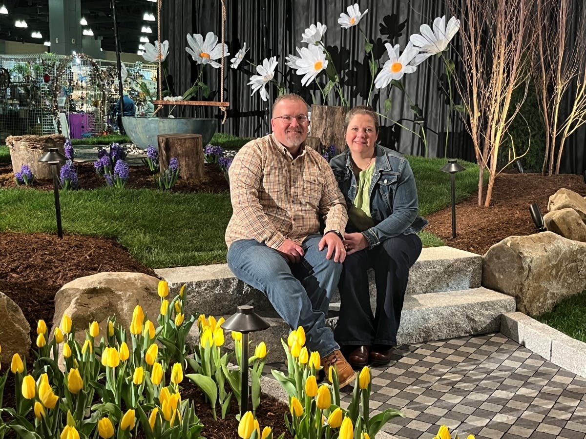 Pictured in the winning landscape are Ironwood Landscaping’s owners Mike and Emilie Sipala.