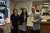 The founders of John's Men's Clothing received a proclamation from County Councilman Tony Giangiordano.