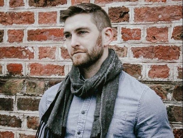 An Anne Arundel County man is among PETA's "Sexiest Vegan Next Door" finalists; online voting determines the winner.