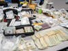 Police said there was about $14,500 in cash found in Autumn Branch Lane.