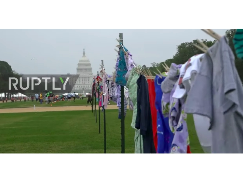 Pajamas at the National Mall represented children who were separated from their parents, organizers said.