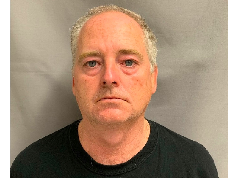 Timothy Ervin Trivett is charged with impersonating a police officer.