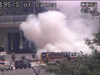 At 1:07 p.m., white smoke billowed from the area of Interstate 95 near Caton Avenue.
