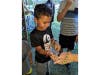 Caleb warmed up to a smaller snake presented to him at the farm fair.