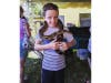 Hank was braver than his brother, Caleb, with the snake at the farm fair in Bel Air.