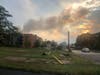 Smoke was visible northeast of Green Mount Cemetery after fire broke out Tuesday, Aug. 6.