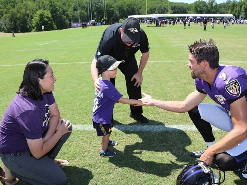 Ravens kicker Justin Tucker gave Gov. Larry Hogan's grandson a lesson in kicking during a recent practice.
