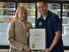 Mayor Susan Burdette presented a proclamation to Pure Raw Juice owner Richard Manson.