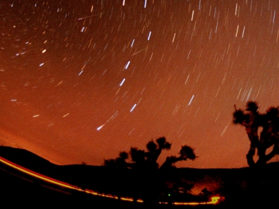 In this 15-minute timed exposure in 2001, when a major meteor storm erupted, four meteors streaked through the sky. The meteor shower in Maryland that will peak Nov. 18 to 19 could produce 10 to 15 meteors an hour.