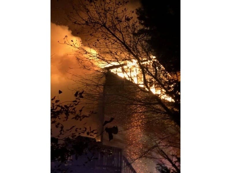 About 60 firefighters were called to the Nov. 16 fire in Hunters Run. A neighbor discovered the blaze, the fire marshal said.