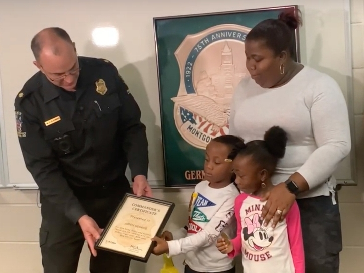 A four-year-old Germantown resident was recognized for rescuing his mother who was in medical distress.