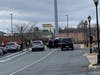 Police set up a perimeter behind the Bel Air Plaza shopping center.