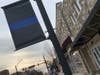 Banners on Main Street in Bel Air honor Senior Deputy Patrick Dailey, 52, of Joppa, and Deputy First Class Mark Logsdon, 43.