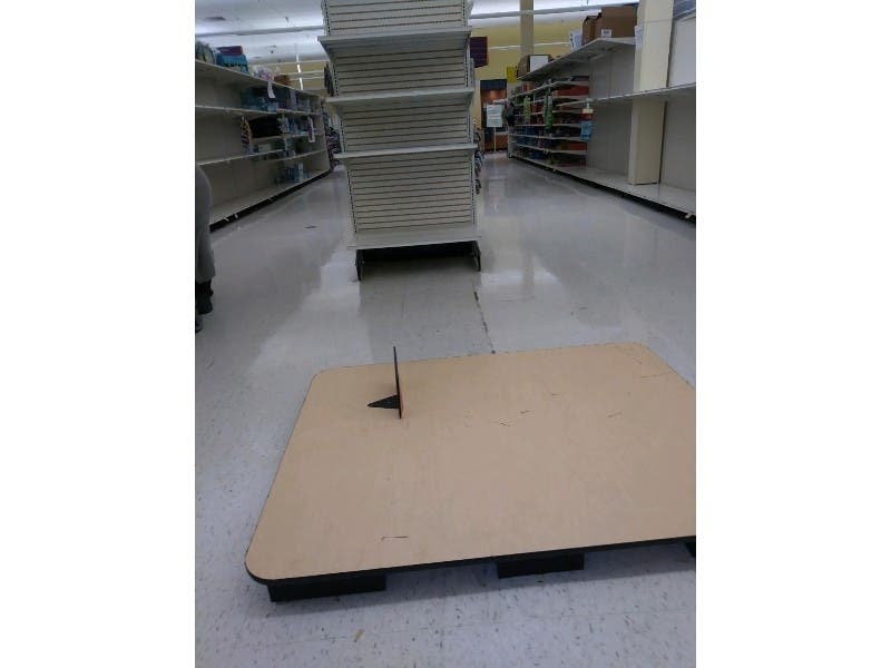 Giant is setting aside one hour each day for people 60 and up. Pictured are empty displays and bare shelves in the Catonsville Giant on Saturday, March 14.