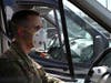 U.S. Air Force Airman First Class Brian Leschke, 175th Maintenance Squadron, Maryland Air National Guard, wears medical personal protective equipment at BWI before driving cruise ship passengers from the Grand Princess to self-quarantine.