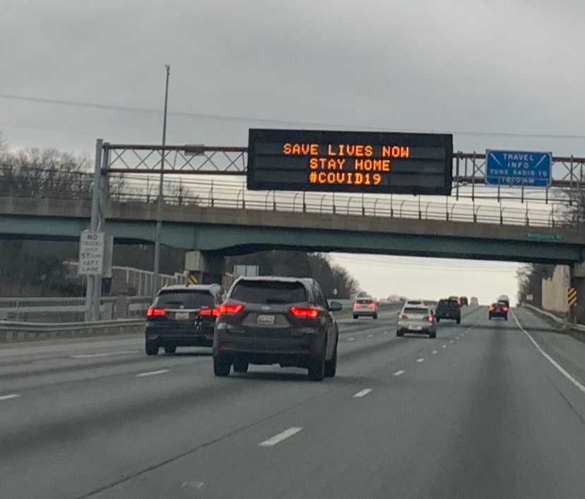 A sign on Interstate 95 near Montgomery Road in Elkridge tells people to stay home, a reminder County Executive Calvin Ball reiterated after two deaths from the virus were reported Sunday, March 29.
