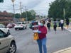 People honked as participants marched on Reisterstown Road.