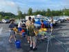 Staff members were told to park their cars in the lot, and when they came back after work, the scouts from Boy Scout Troop 877 had washed them.