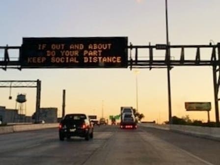 Highway signs on Interstate 95 near Baltimore encourage social distancing.