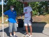 Councilman Julian Jones (left) speaks with Frederick Strickland, who organized the July 18 march in Randallstown.