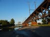 The parking lot under the railroad bridge was flooded Tuesday evening.