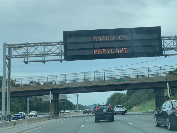 Maryland highway signs encourage the use of face coverings to prevent the spread of the coronavirus.