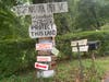 Signs near the property under consideration for annexation reflected the concern of area residents about potential development.