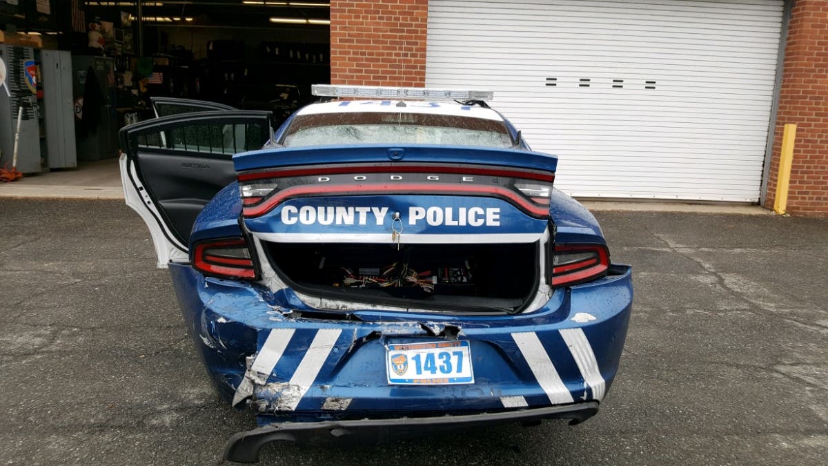 A county police officer was injured when an accused drunken driver rear-ended his patrol car.