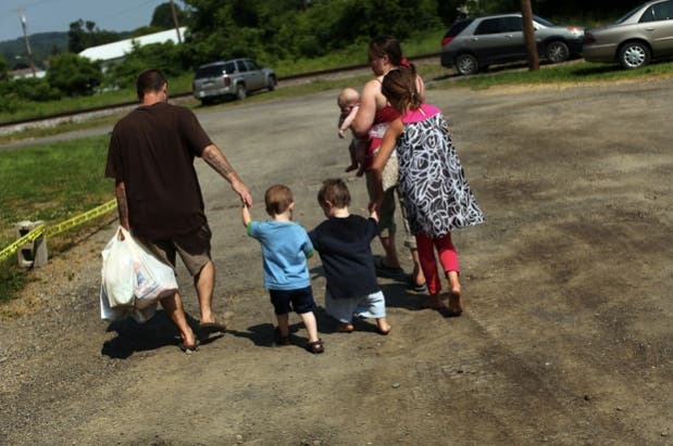 These parents in upstate New York depend on their local food pantry to provide nutritious food for their children.