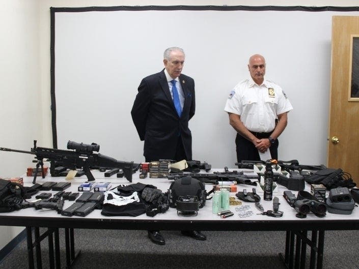 A Long Island plastic surgeon was arrested last week with a large cache of weapons, police said.