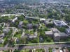 An aerial view with the outline of the College of New Rochelle campus.