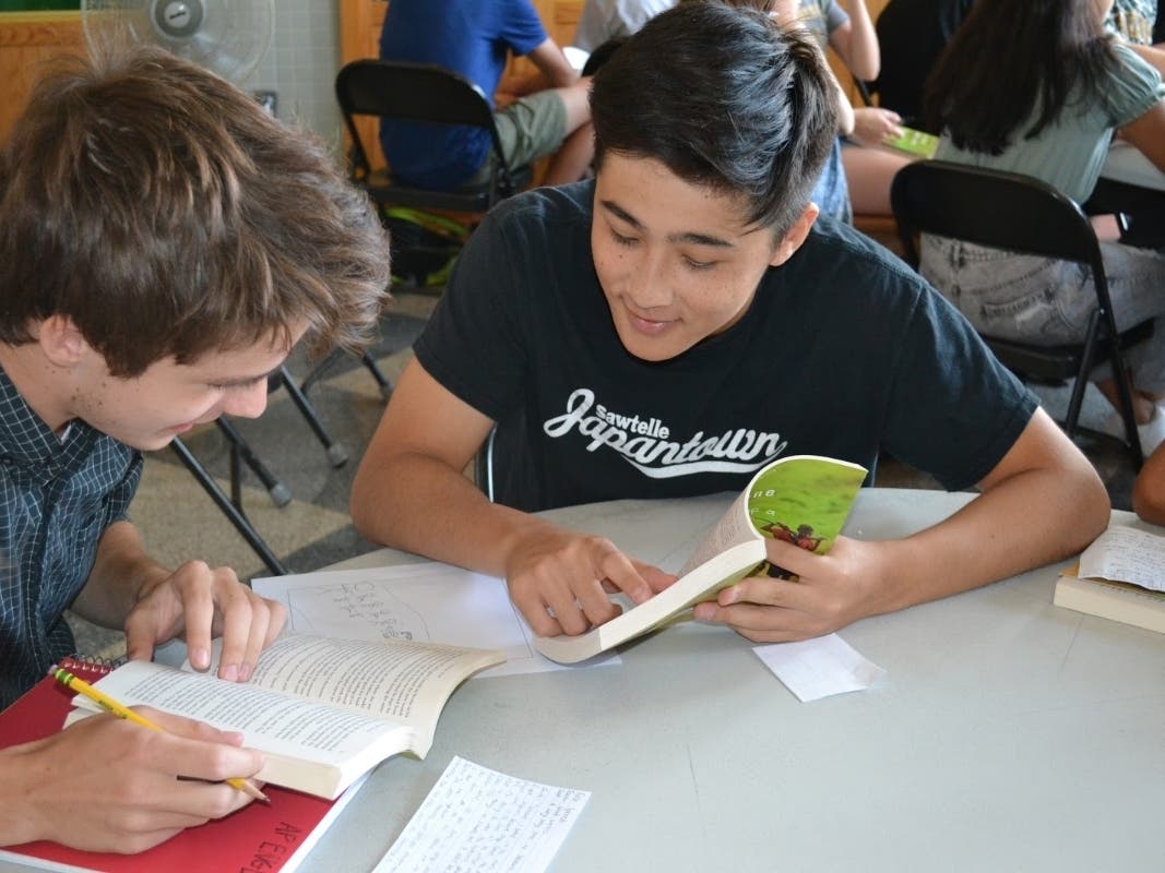 Hastings High School students engaged themselves in conversations after their summer reading assignment.