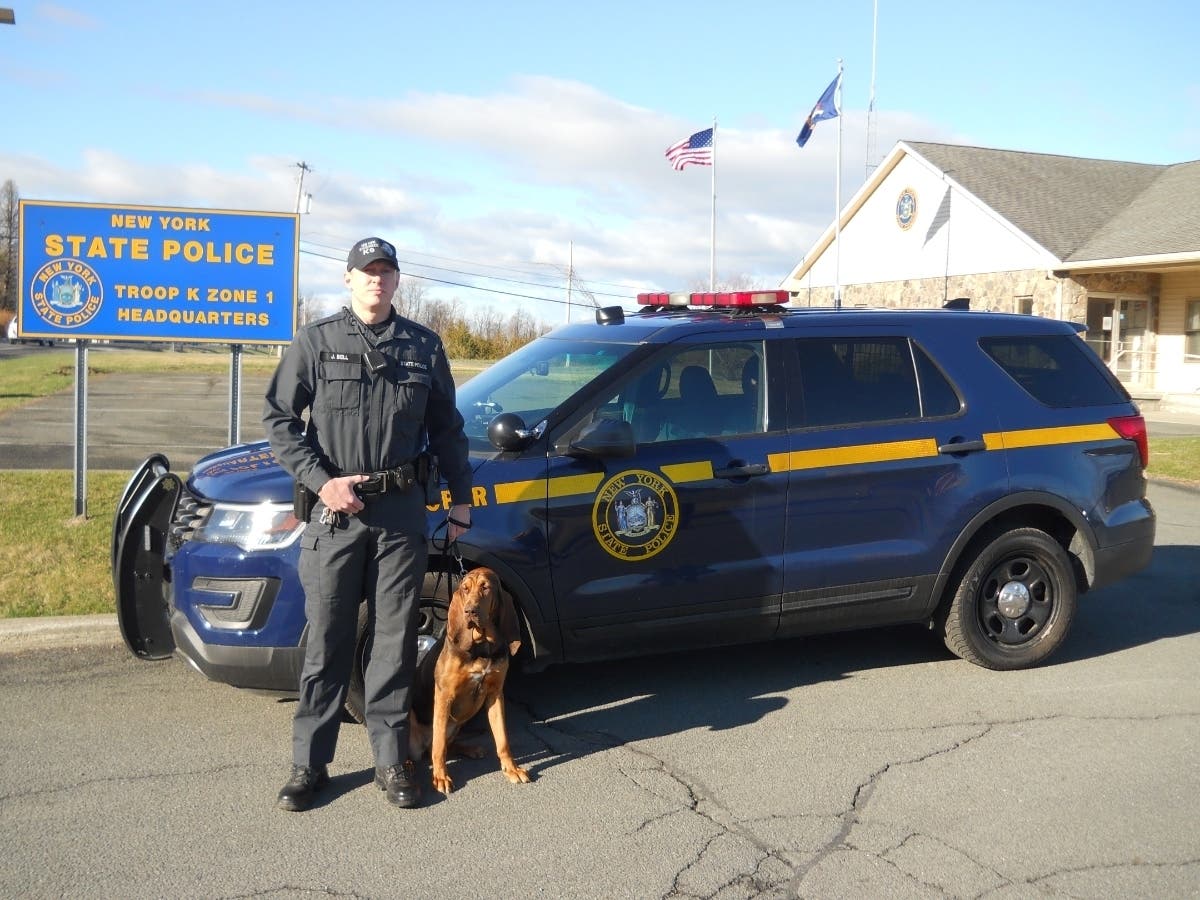 Trooper Justin Bell and his K-9 bloodhound Tilly.