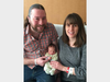 Peekskill residents Brian and Kayte Handler and new son.