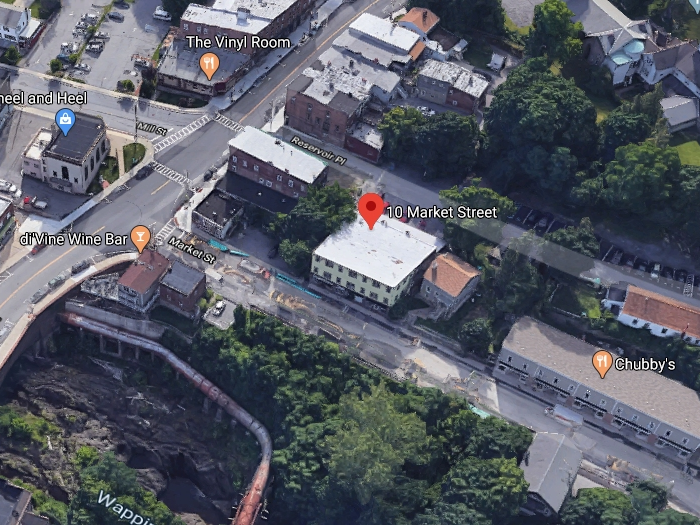 A fire Tuesday destroyed businesses and displace people from 10 apartments in Wappingers Falls.