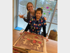 Staff at Blythedale Children’s Hospital received free pizza courtesy a former president and a former secretary of state.