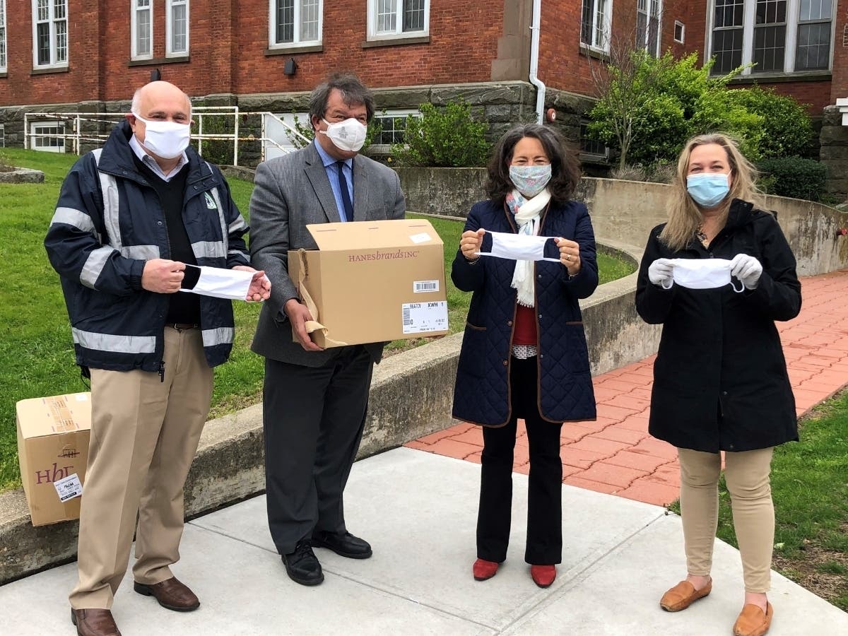 From left, Town Administrator Stephen Altieri, County Executive George Latimer, Town Supervisor Nancy Seligson and County Legislator Catherine Parker stand in front of the Mamaroneck Town Center with donated masks.