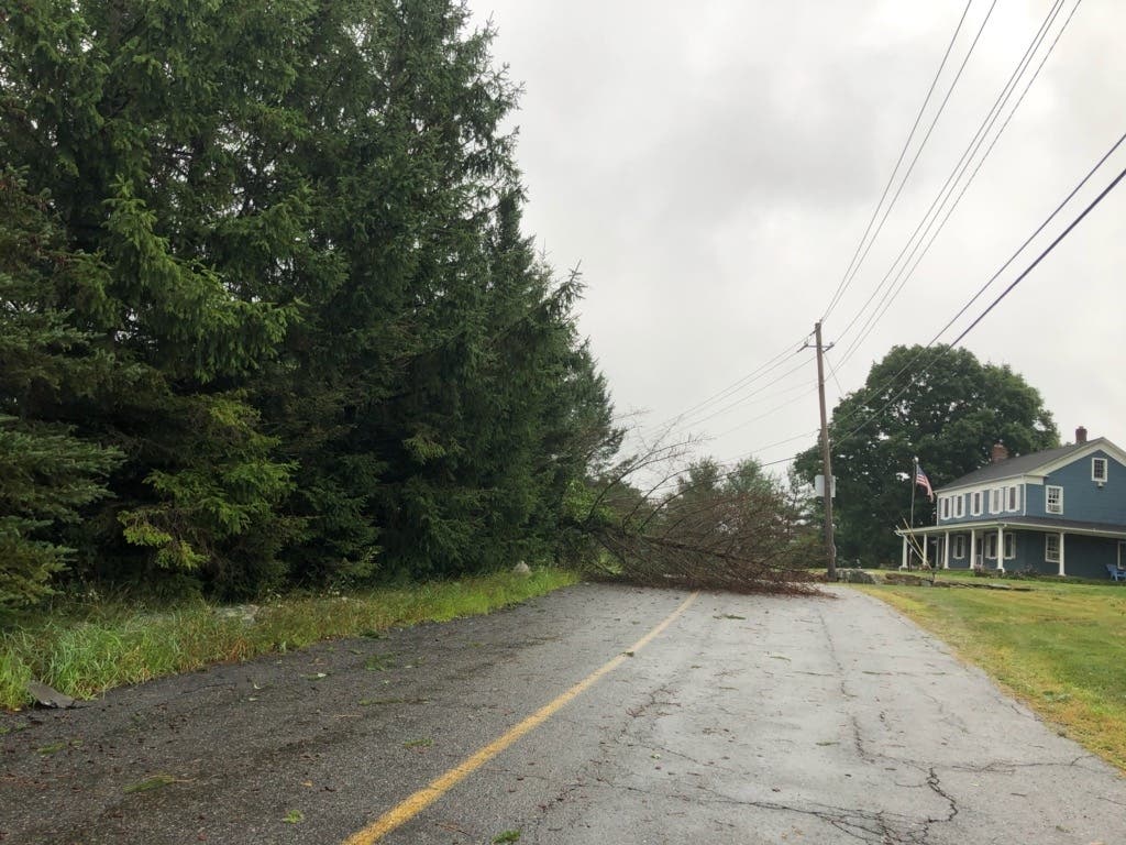 A downed tree blocks a road in Putnam County Tuesday, Aug. 4, 2020. Tropical Storm Isaias has started affecting the Hudson Valley with winds and rain — and power outages.